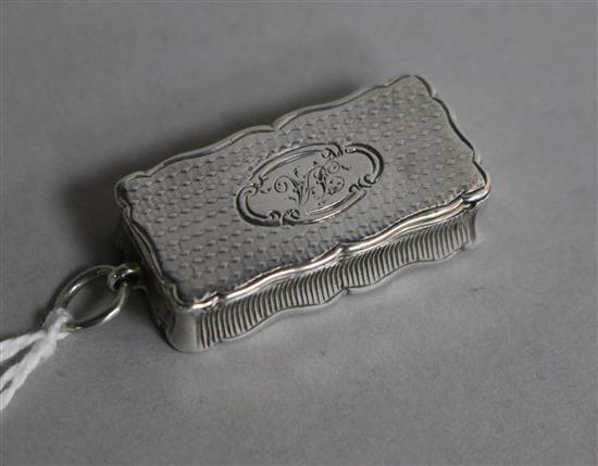 A Victorian silver vesta/vinaigrette by Aston & Son, Birmingham 1857, 30mm.